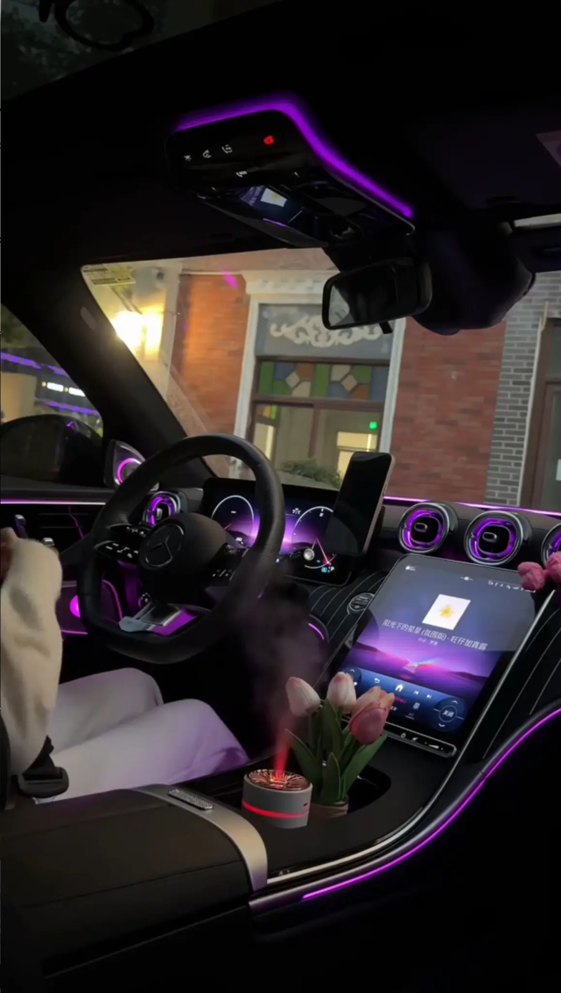 Luxury car interior — purple ambient lighting